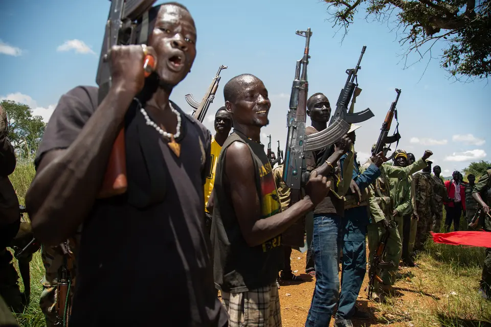Rebels of the Sudan People's Liberation Movement-in-Opposition (SPLM-IO), a South Sudanese anti-government force, take part in a military exercise at a base in Panyume, on the South Sudanese side of the border with Uganda, on September 22, 2018. Despite a peace deal being signed by the President of South Sudan, Salva Kiir, and opposition leader Riek Machar on September 12, conflict in Central Equatoria continues as both warring parties fight for control. (Photo by SUMY SADURNI / AFP)